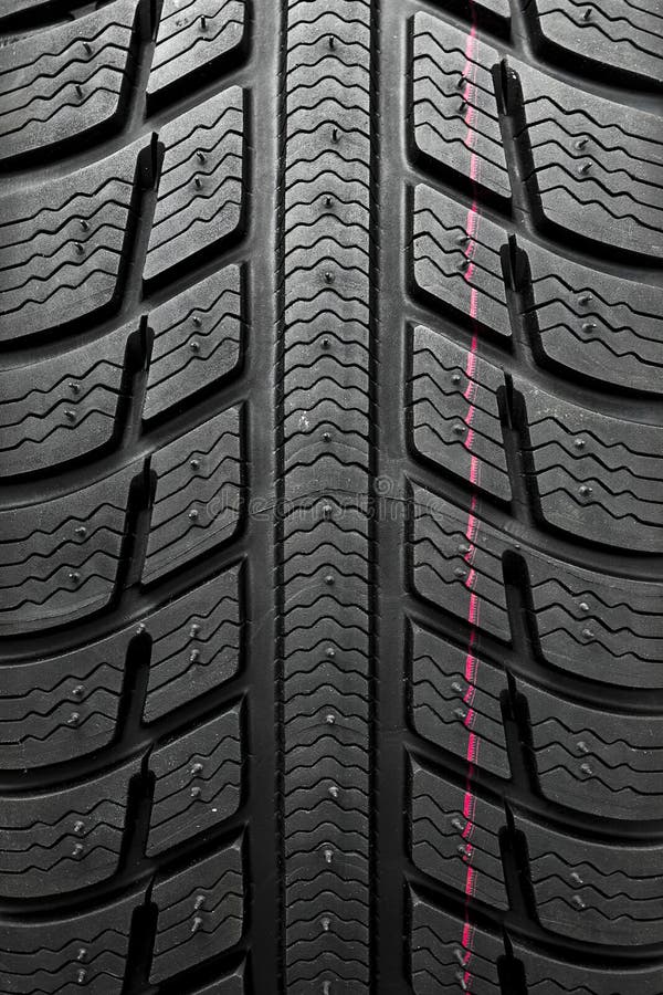 Winter Car Tires Closeup Wheel Profile Structure on White Background