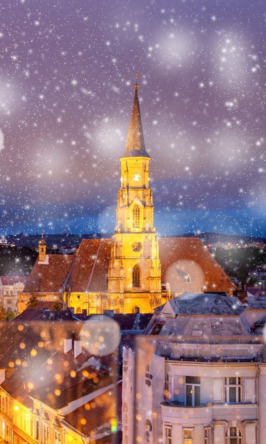 winter in Cluj-Napoca, Saint Michael church in snowfall - winter holiday destination, Romania