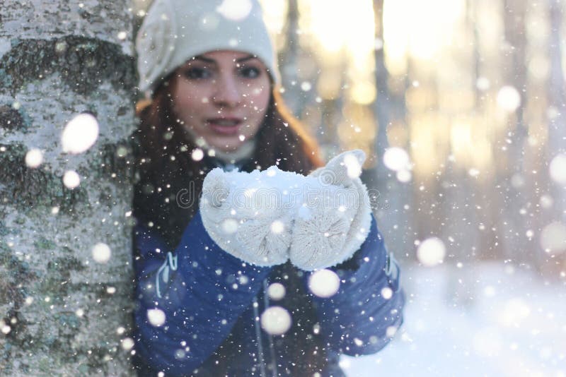 Winter girl snowball stock photo. Image of portrait - 104761712