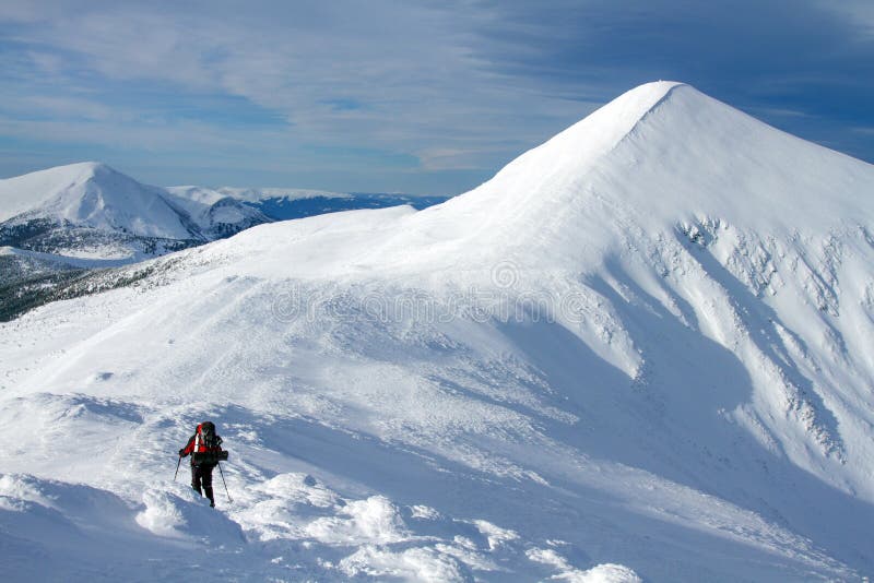 Winter hiking in the mountains on snowshoes with a backpack and tent. Winter trekking. Backpack snowshoeing stock images, royalty-free photos and pictures