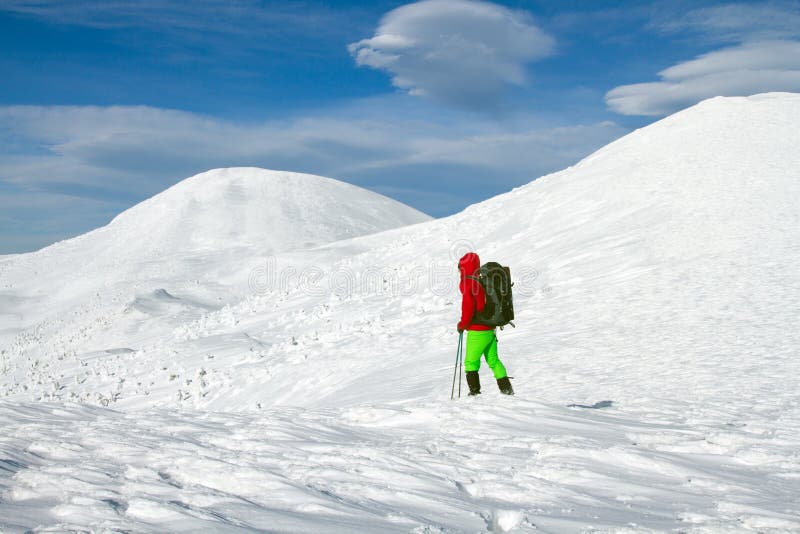 Winter hiking in the mountains on snowshoes with a backpack and tent. Winter trekking. Backpack snowshoeing stock images, royalty-free photos and pictures