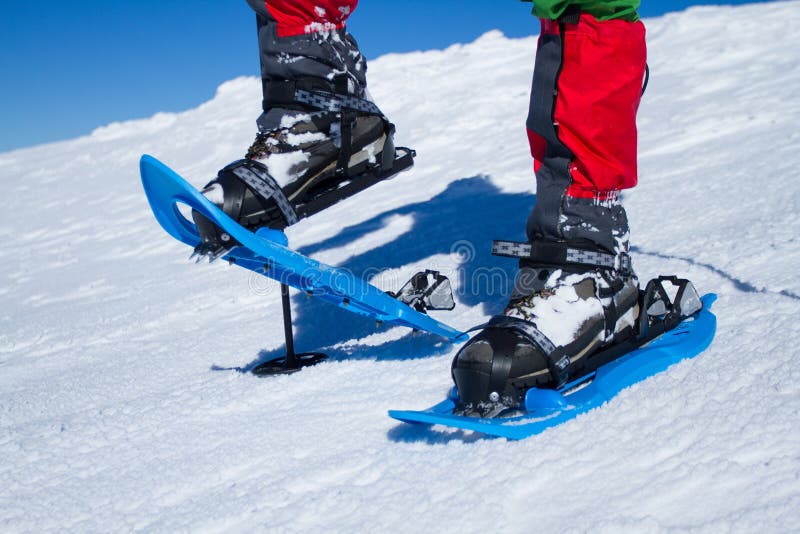 Winter hiking in the mountains on snowshoes with a backpack and tent. Backpack snowshoeing stock images, royalty-free photos and pictures