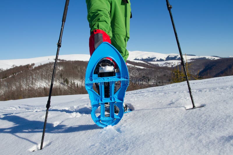 Winter hiking in the mountains on snowshoes with a backpack and tent. Backpack snowshoeing stock images, royalty-free photos and pictures