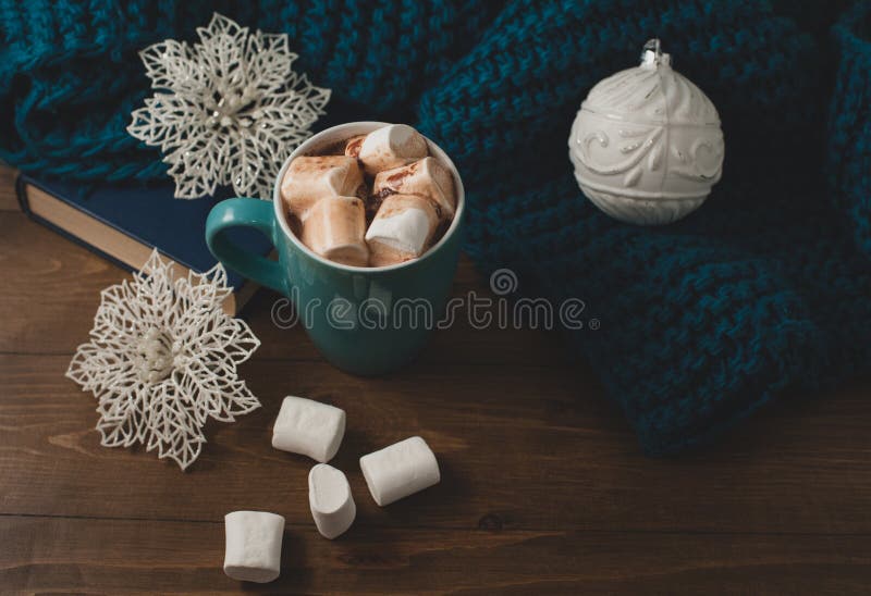 Winter home background - cup of hot cocoa Christmas ball and s