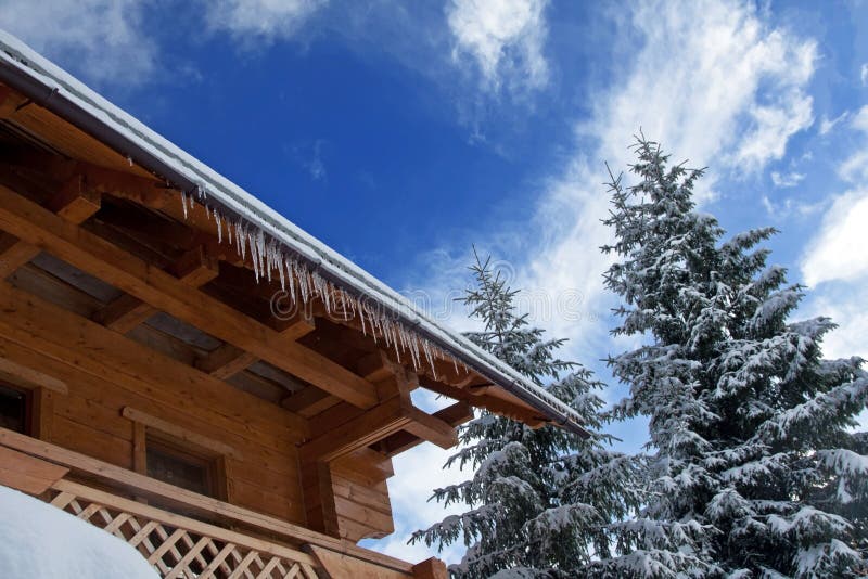 Winter house with icicles