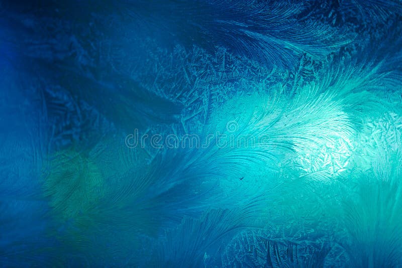 Winter ice frost, frozen background. frosted window glass texture. Cold cool icicles background. Winter wonderland scene.