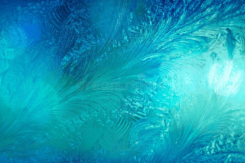 Winter ice frost, frozen background. frosted window glass texture. Cold cool icicles background. Winter wonderland scene.