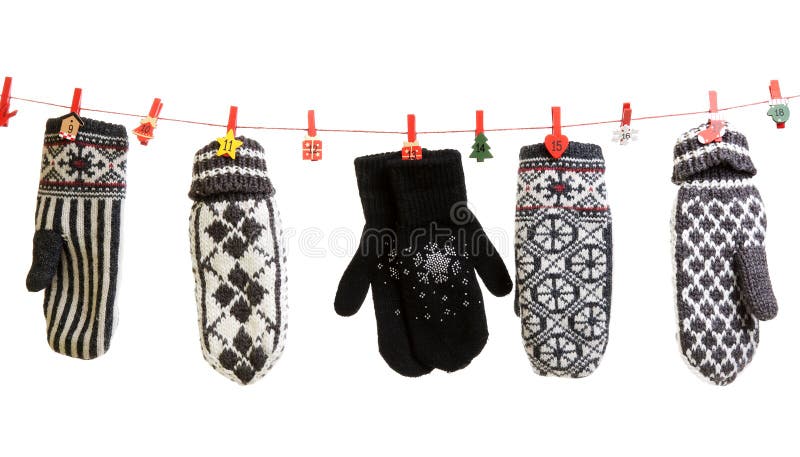 Winter knitted gloves hang