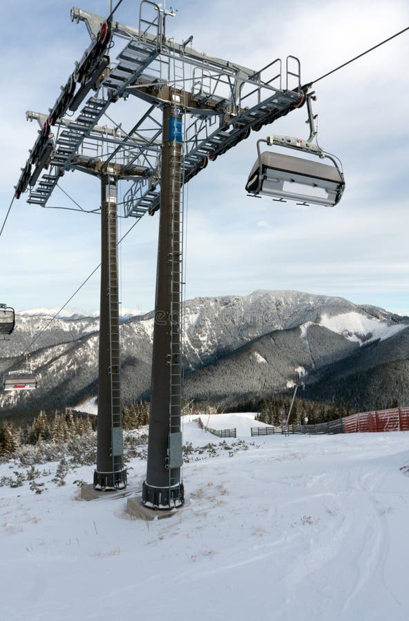 Winter landscape with a cable cars