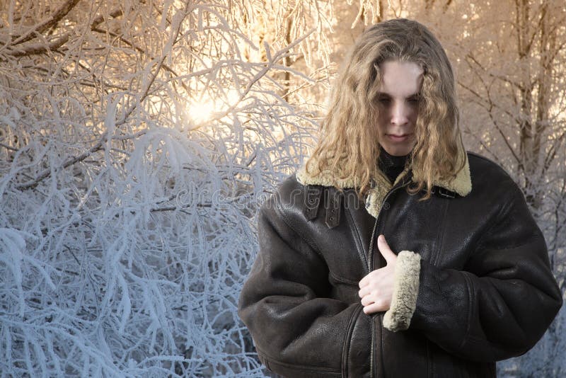 Winter leather jacket made of natural fur. Sale of winter jackets royalty free stock photo