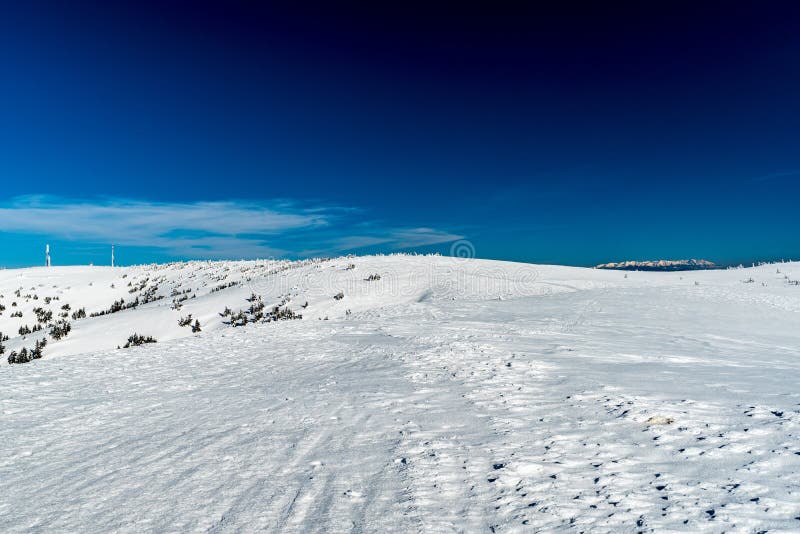 Winter Martinske hole with Krizava and Velka luka hills and Tatra mountains on the background in Slovakia