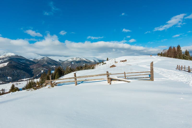 Winter morning mountain rural snow covered path