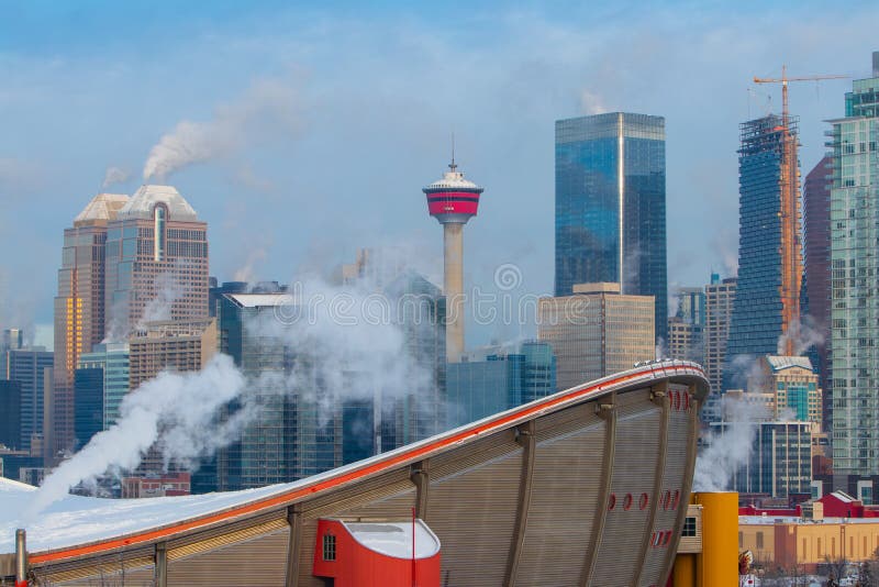 Winter morning at the smoky Calgary, Travel Alberta, Canada, Nort America, Arctic winter, extreme weather, covered under snow royalty free stock photo Winter morning at the smoky Calgary, Travel Alberta, Canada, Nort America, Arctic winter, extreme weather, covered under snow royalty free stock photo