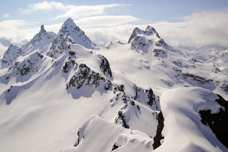 Winter mountain landscape in the Swiss Alps above Klosters with the Gross Litzner and Gross Seehorn mountain peaks