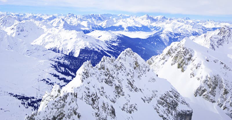 Winter panorama tyrol alps. Winter panorama from the top of mount valluga in the arlberg ski resort in the tyrol alps in austria stock photos