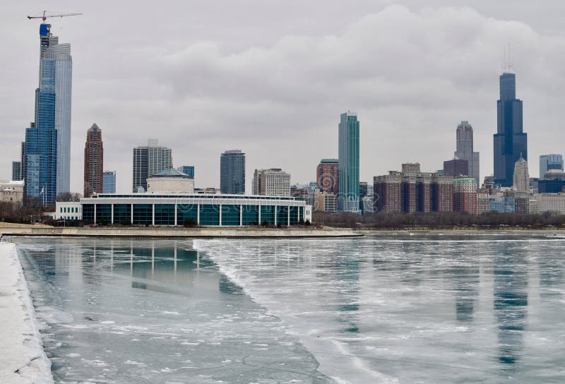 Winter Picture of the Shedd Aquarium #2. This is a Winter picture of the iconic Shedd Aquarium looming over the ice of frozen Monroe Harbor on a Lake Michigan stock photo Winter Picture of the Shedd Aquarium #2. This is a Winter picture of the iconic Shedd Aquarium looming over the ice of frozen Monroe Harbor on a Lake Michigan stock photo