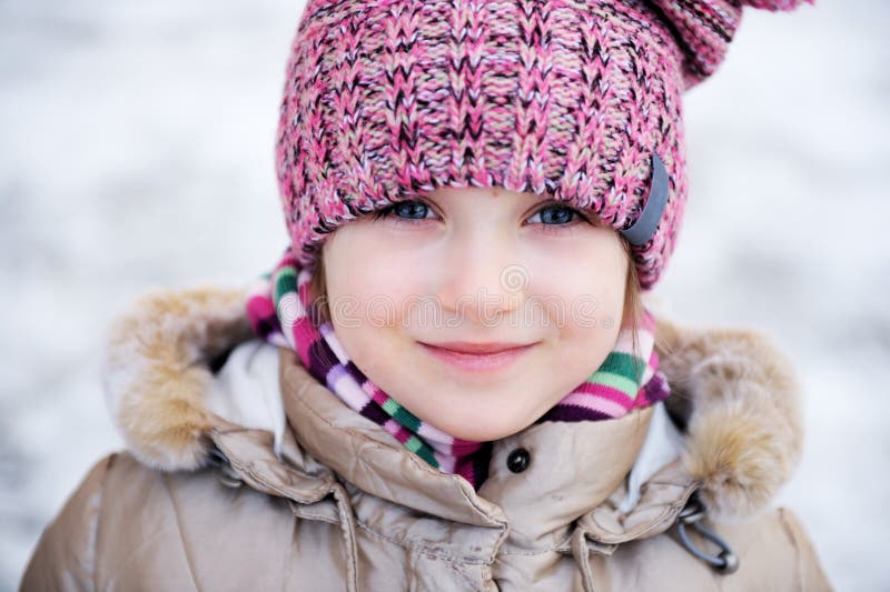 Winter portrait of adorable small