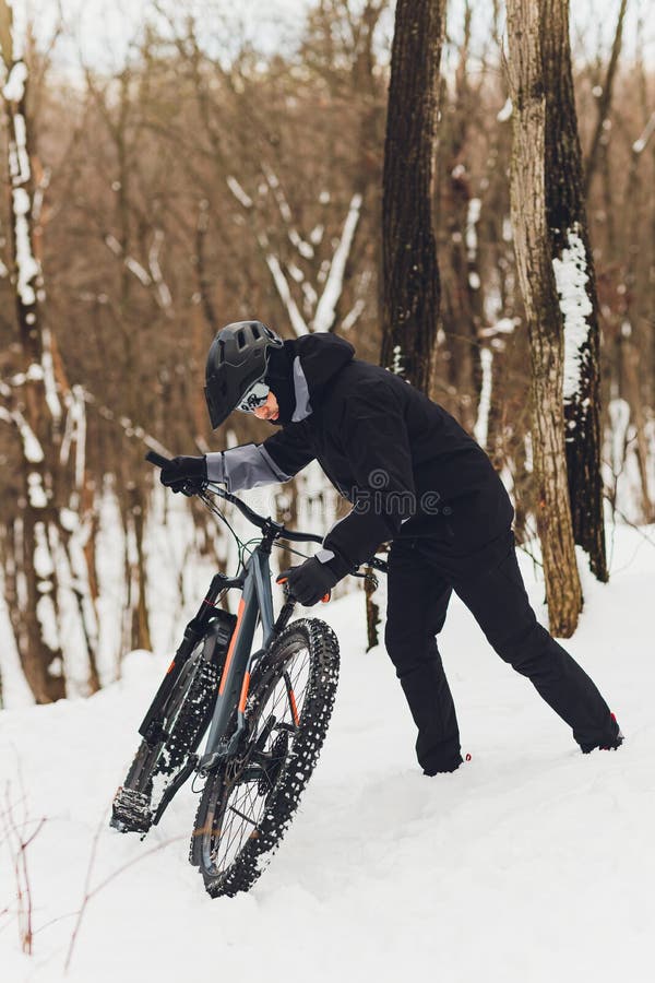 Winter Riding a Mountain Bike in the Forest. Stock Image Image of bicycle, male 179063043