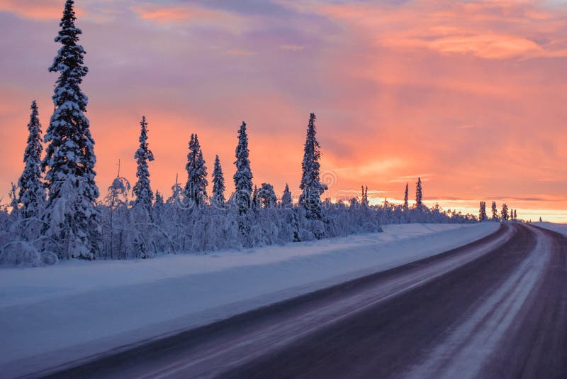 Winter road in the arctic during sunset