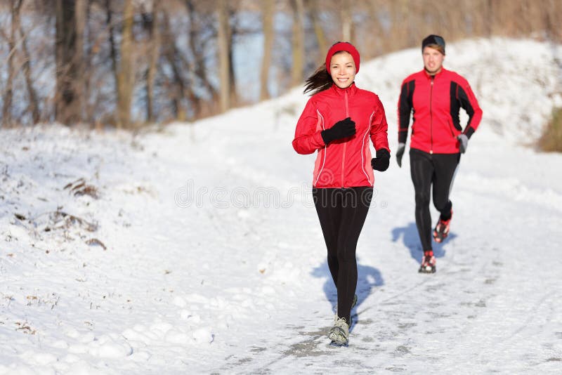 Winter running exercise couple