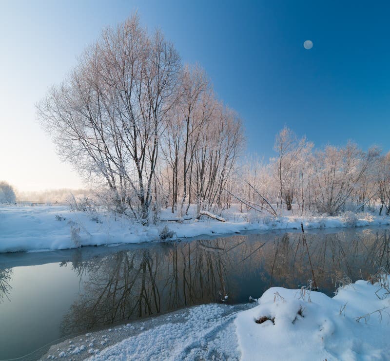 Winter scene on the river stock photo. Image of reflection - 26207746