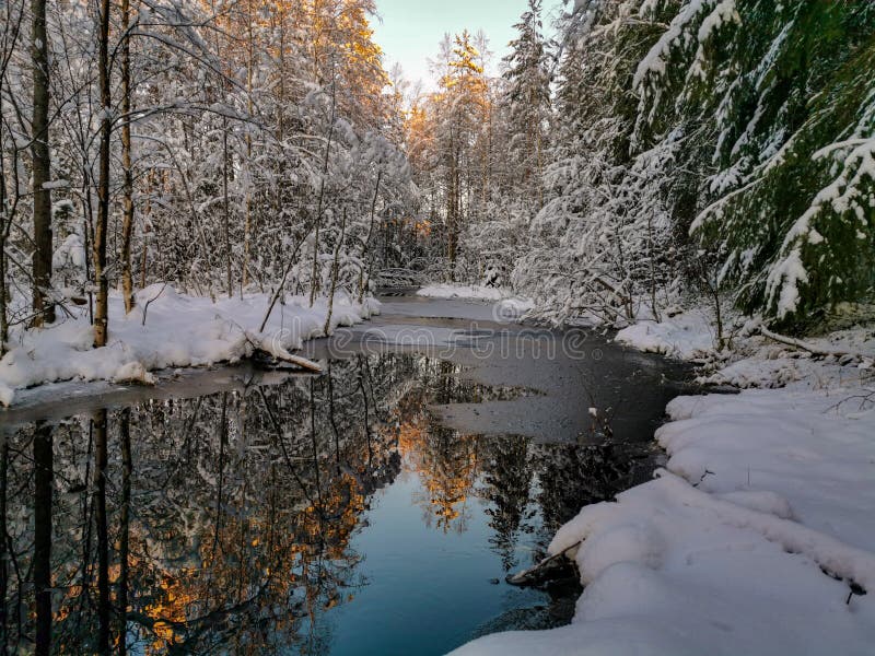 Winter scene with water reflection