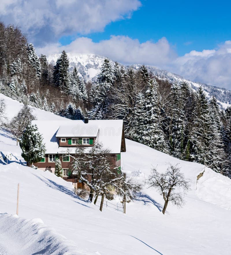 Winter ski chalet and cabin in snow mountain