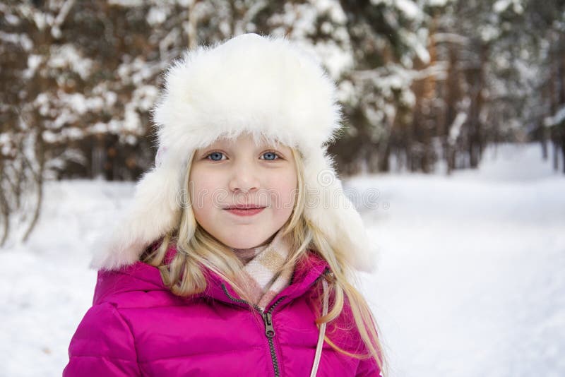 In Winter, Snow-covered Pine Forest Plays a Beautiful Little Girl. on ...