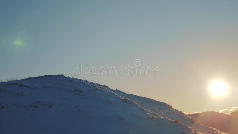 Winter snow mountain landscape before the storm. mountains winter snow sunset sunshine beautiful landscape. Sunny Winter