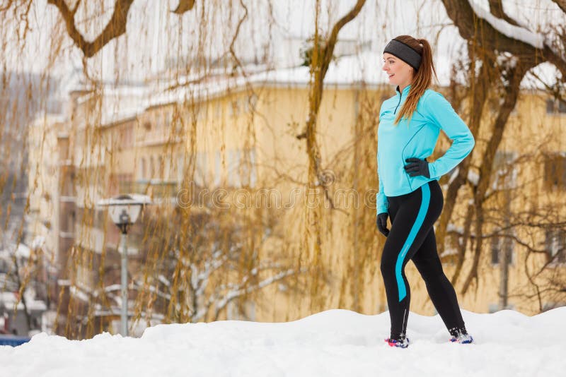 Winter sports, girl exercising in city stock photography Winter sports, girl exercising in city stock photography
