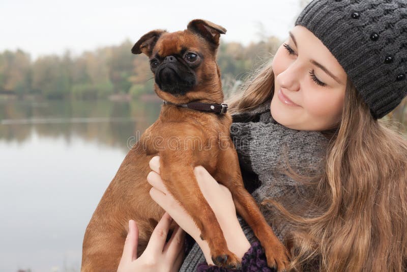 Winter teenager and her dog