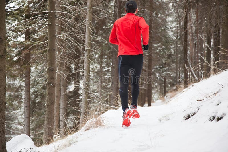 Winter trail running royalty free stock photo