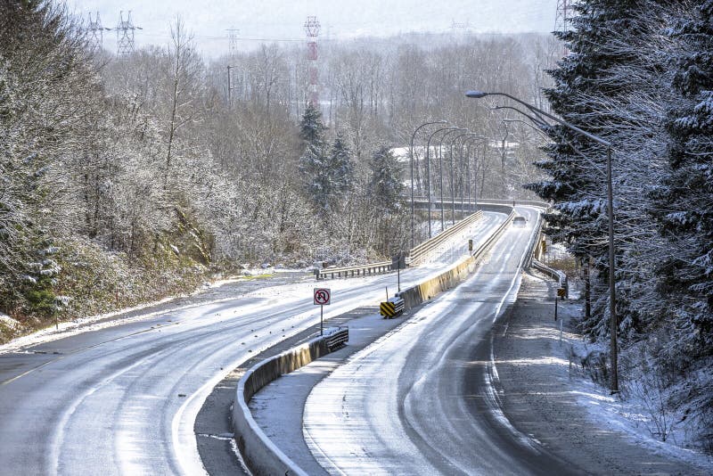 Winter winding snowy divided road to Colombia River Gorge stock image Winter winding snowy divided road to Colombia River Gorge stock image