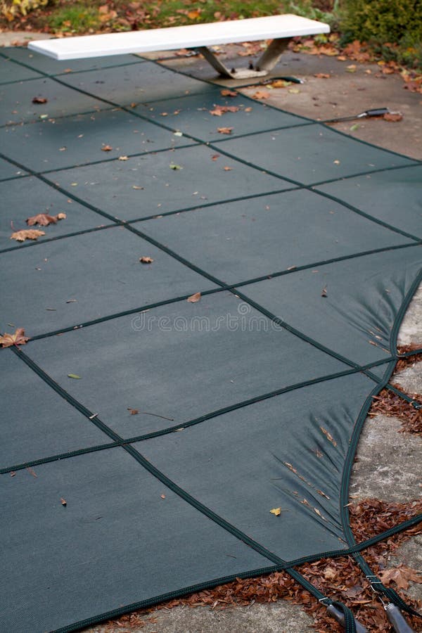 Winterized backyard swimming pool royalty free stock photos