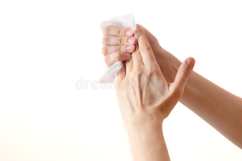 Wipe To Disinfect or Clean Hands with a Damp Cloth on a White