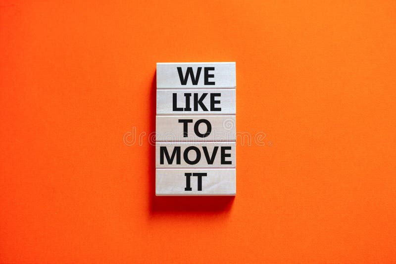 We like to move it symbol. Concept words We like to move it on wooden blocks. Beautiful orange table orange background. Business motivational We like to move it concept. Copy space. We like to move it symbol. Concept words We like to move it on wooden blocks. Beautiful orange table orange background. Business motivational We like to move it concept. Copy space
