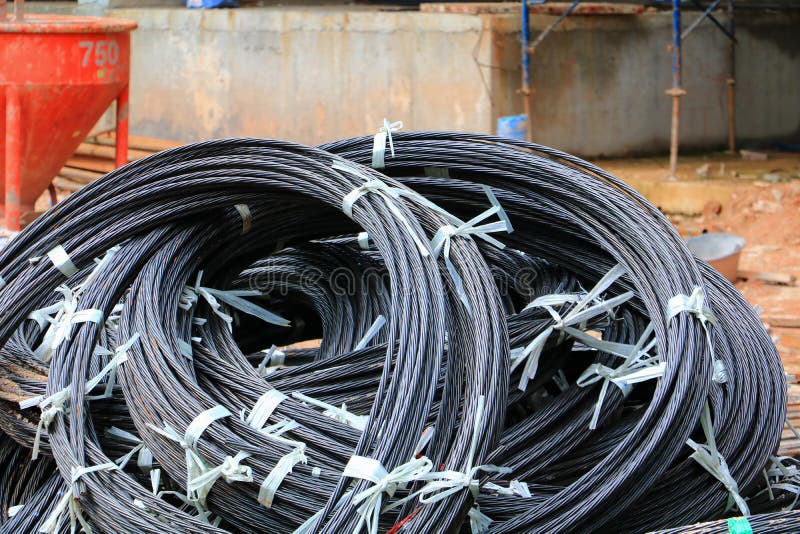 Wire Rod or Coil Sling in a Construction Site on the Ground Stock