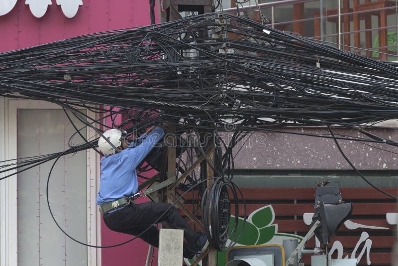 Ho Chi Minh city is famous for its huge river of telephone cables. It is not possible not too see hundreds of wires on the streets. Ho Chi Minh is really wired city!. Ho Chi Minh city is famous for its huge river of telephone cables. It is not possible not too see hundreds of wires on the streets. Ho Chi Minh is really wired city!