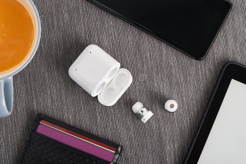 Wireless cordless bluetooth earbuds and chargeable case with smart devies and card wallet. Wireless cordless bluetooth earbuds and chargeable case with smart devies and card wallet