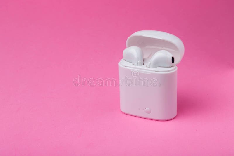 Wireless headphones and charging case. White headphones wireless earphones. Earphones for new modern phone.