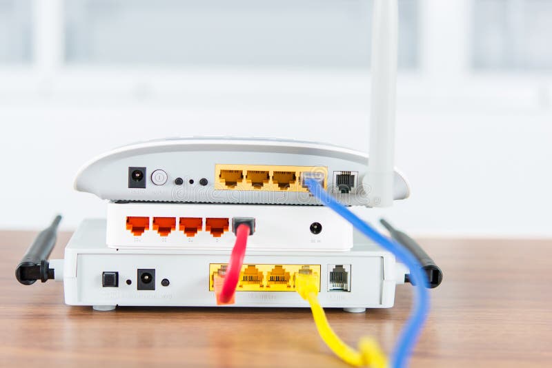 Wireless modem router network hub with cable connect stock images Wireless modem router network hub with cable connect stock images