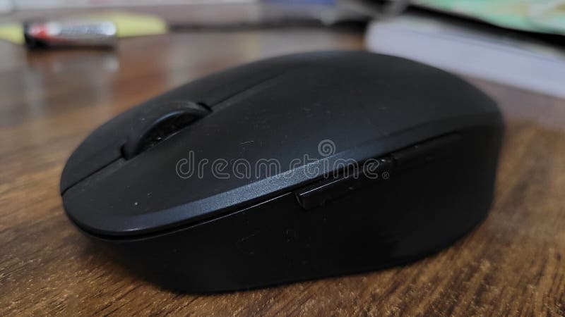 Wireless Mouse Kept on a Wooden Table Top. Stock Photo - Image of ...