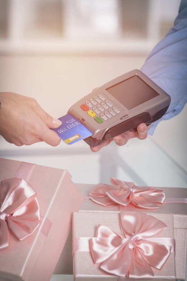 Paying With Credit Or Debit Card For A Gifts Stock Photo Image of reader, electronic 105540732