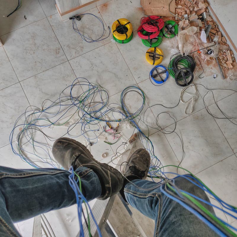 Wireman Doing Wiring Work on Stair Stock Photo Image of wireman