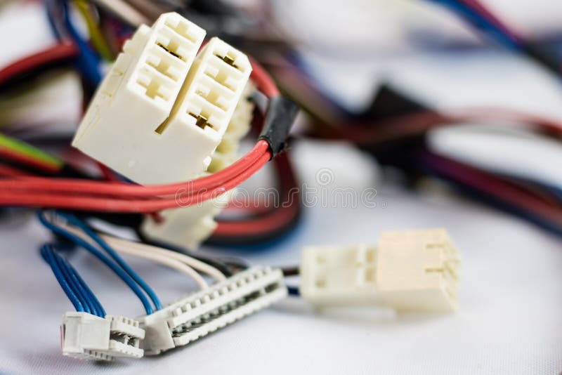 Wires and electrical connectors old parts on white background stock images