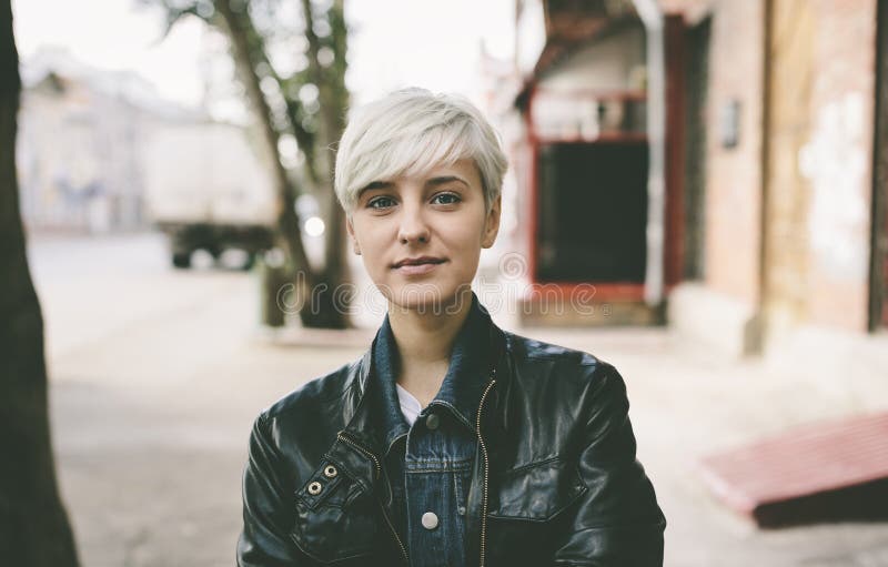 Young woman with short blond hair,natural light. Young woman with short blond hair,natural light