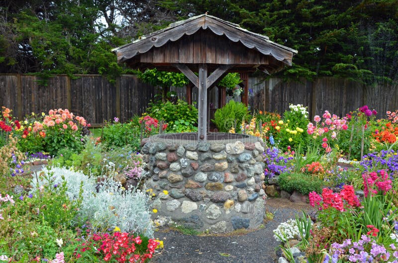 Wishing well in dahlia garden