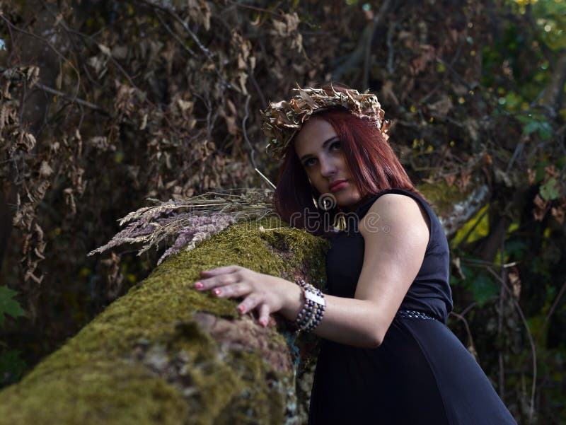 Witch in dark forest stock image. Image of grass, brunette - 58119701