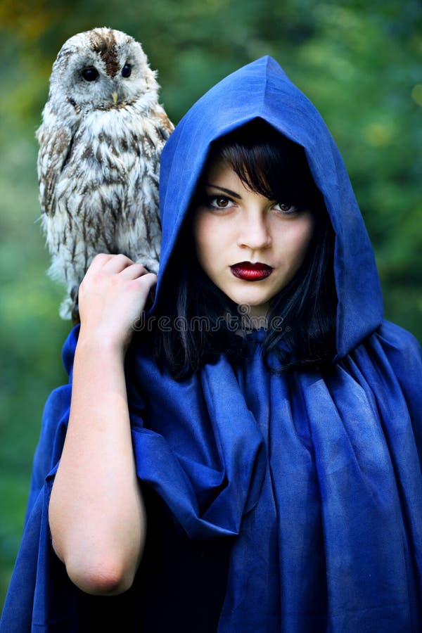 Witch in the hood with an owl