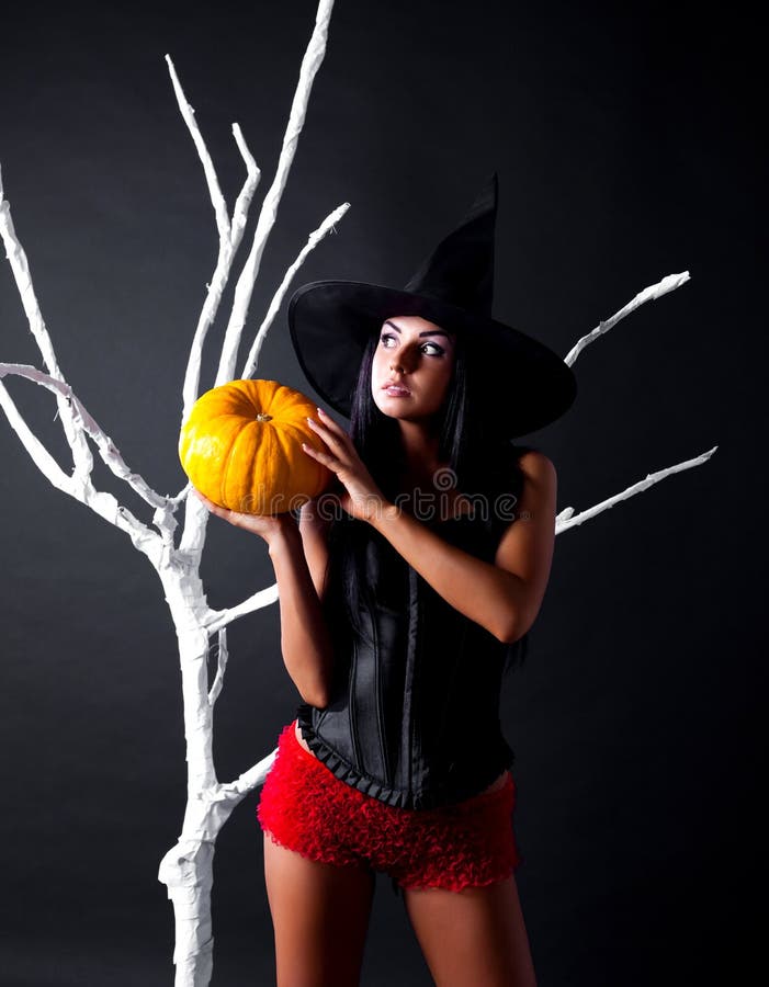 Witch with a pumpkin